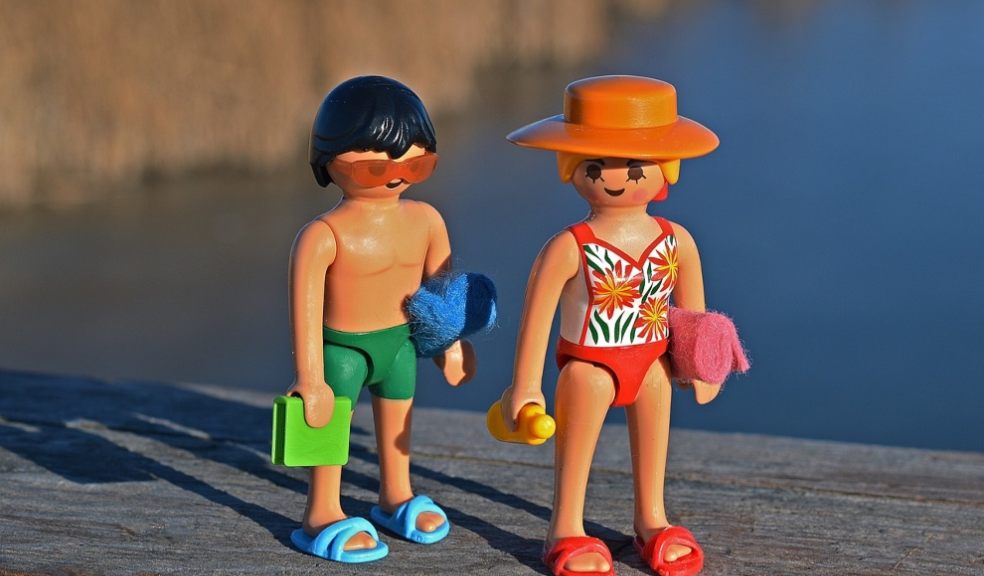 Toy models wearing beach clothes