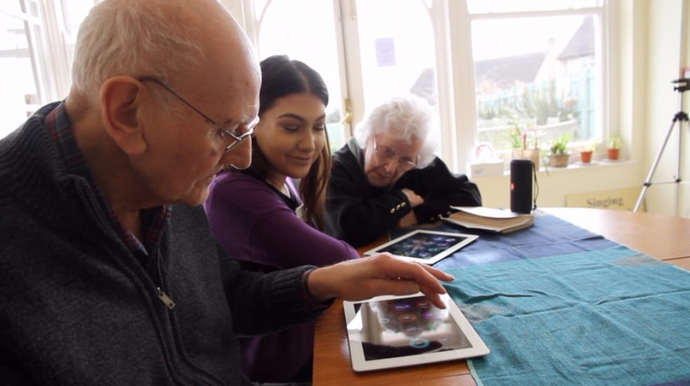  Clients at Peggy Dodd day centre using the MindHarp