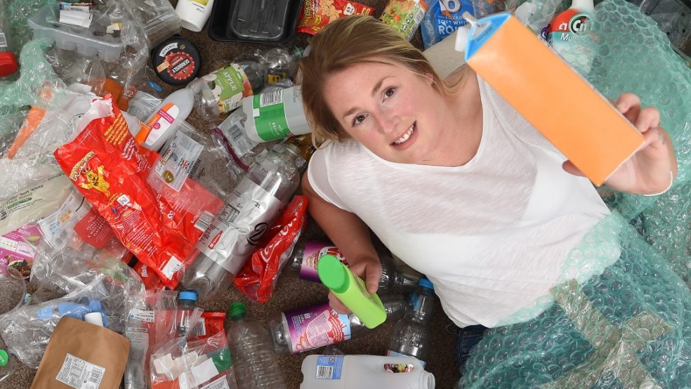 Joanne Machlachlan laying in plastic