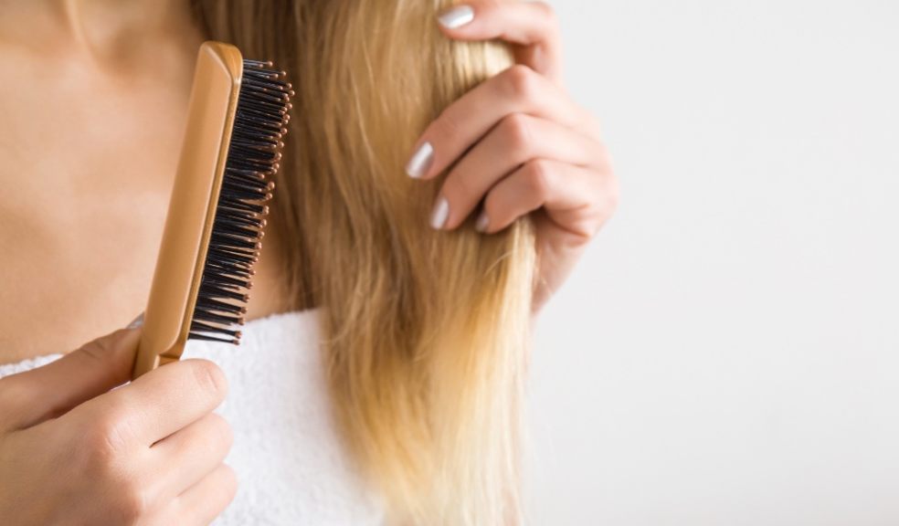 Lady brushing her hair