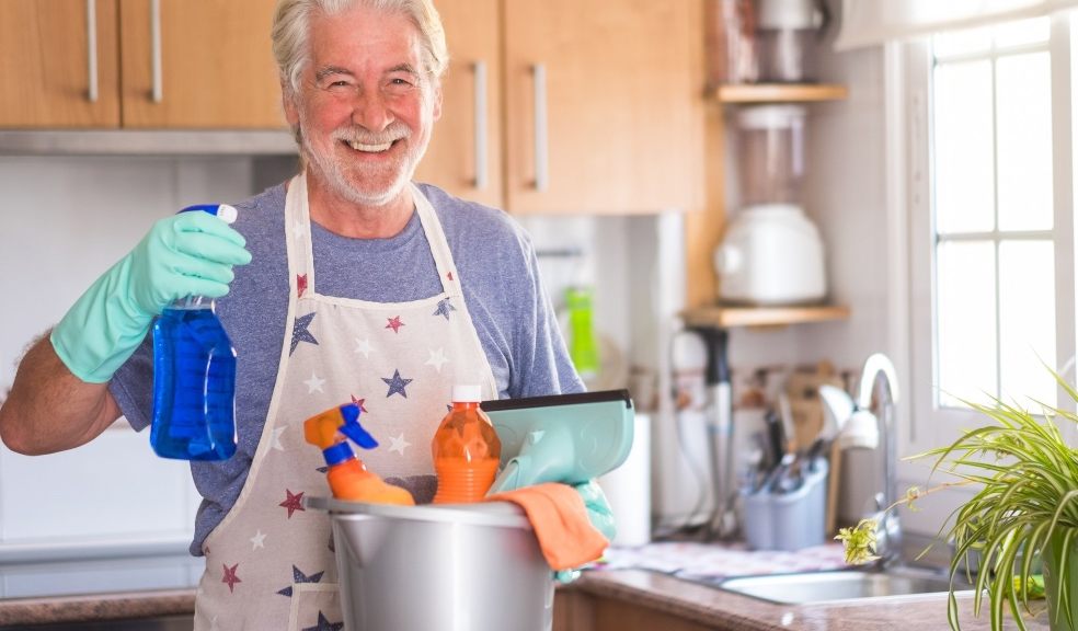 Man cleaning at home