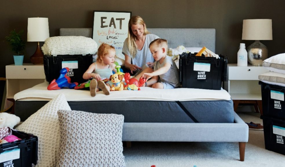 Moving home lady in bedroom