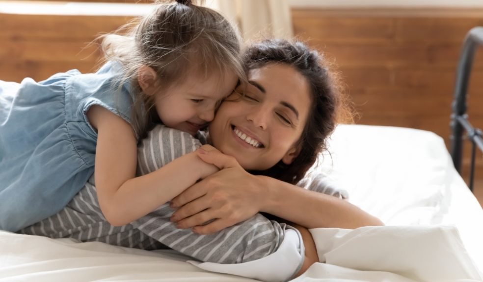 Mum and Daughter hugging