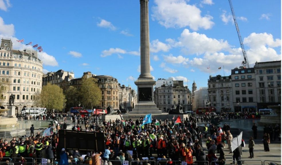 Crowd gathered in Trafalgar Square during a London protest with police presence, reflecting public safety and how demonstrations impact safety in London