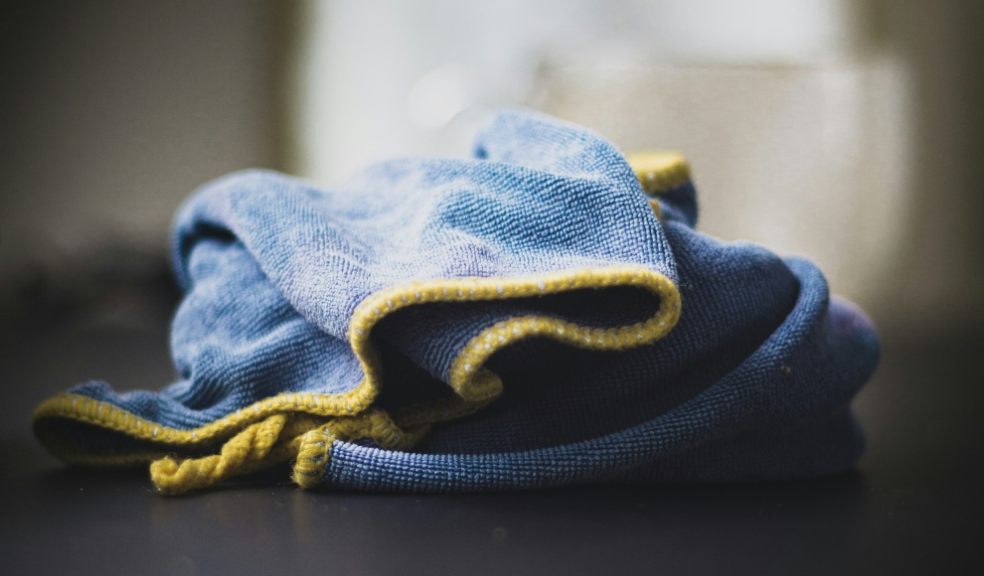 A blue polishing cloth on a table