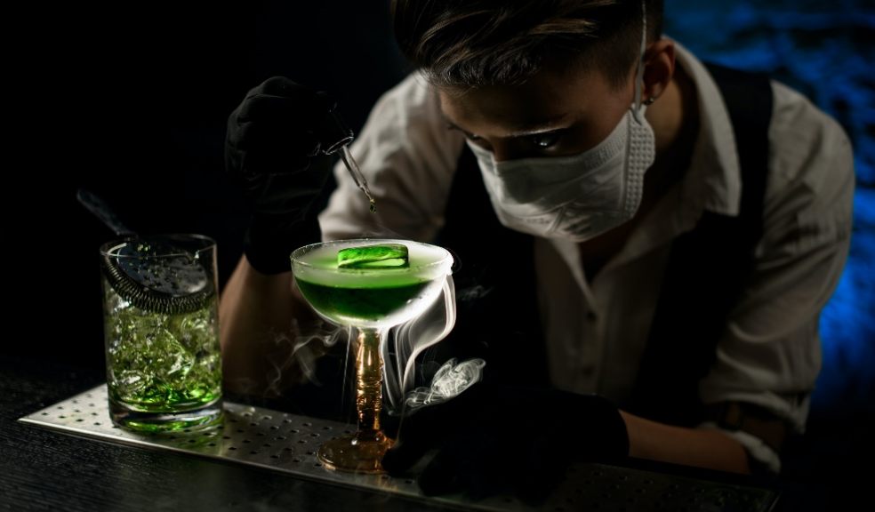 Serving drinks with mask at nightclub