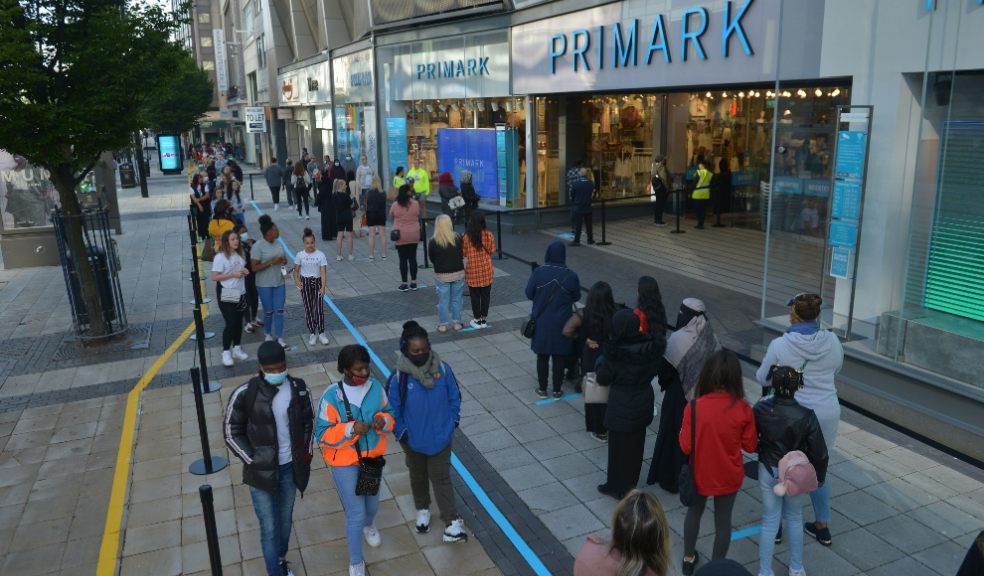 Shoppers queuing outside Primark