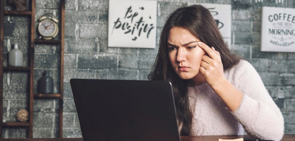 Teen Eye Health and CVS Teen girl squinting whilst looking at computer screen