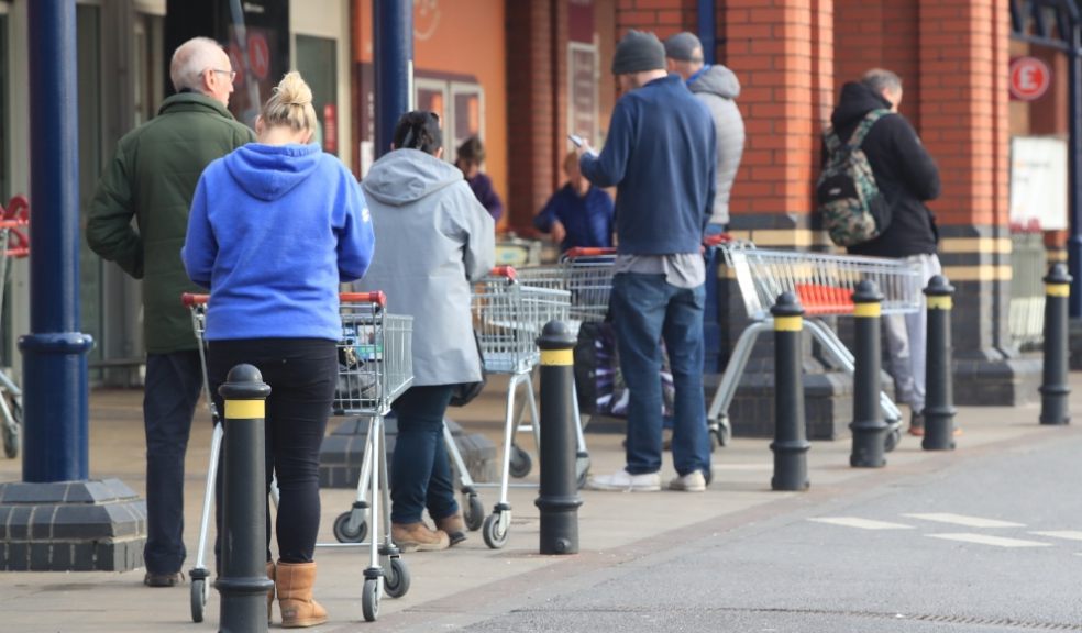 Will supermarket workers be able to keep two metres away from customers? Family (Danny Lawson/PA)