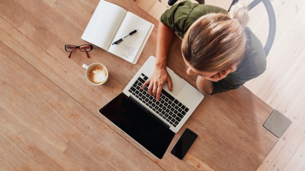 Woman surfing internet at coffee shop