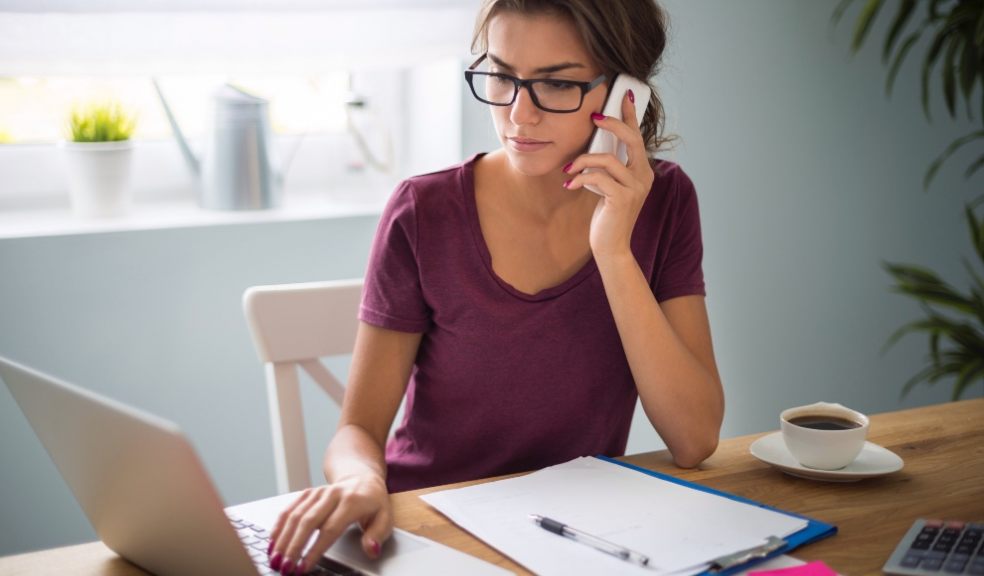 Woman-wearing-glasses- at-computer-checking-finances-lifestyle