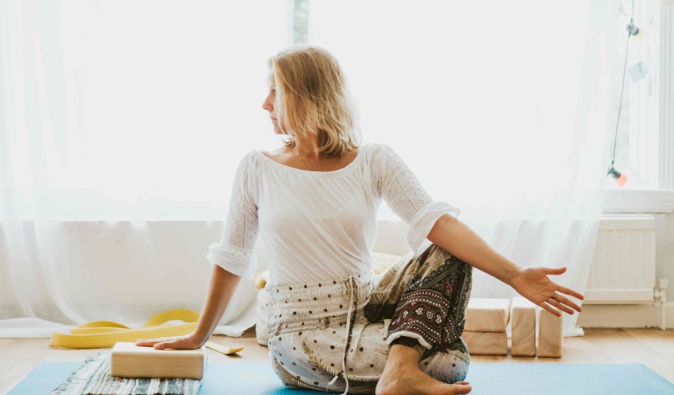 Woman practicing yoga Yoga therapy