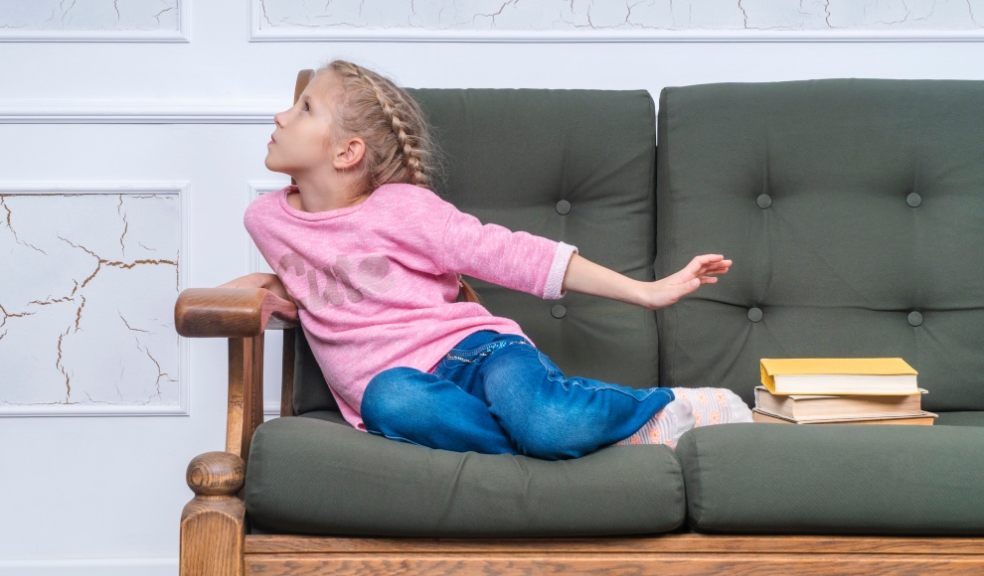 Young girl reluctant to do homework.Family. Getty Images/iStockphoto