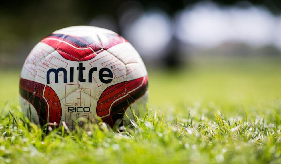 football on grass pitch