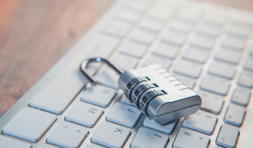 A padlock on a computer keyboard