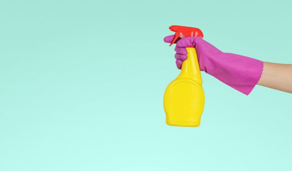 spraying cleaning product