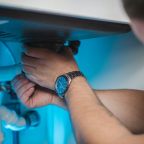 Some DIY jobs like plumbing should be left to the professionals A plumber working under a sink