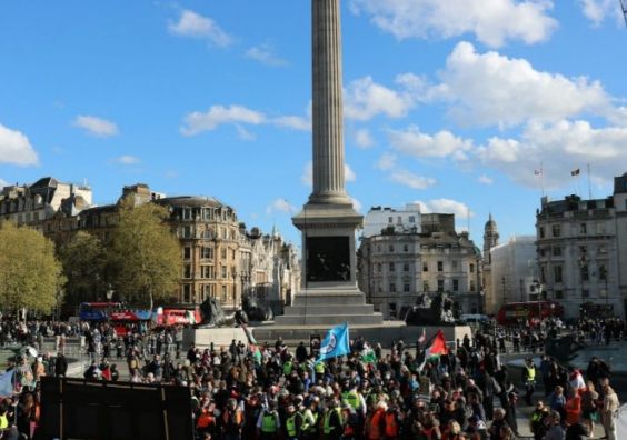 Crowd gathered in Trafalgar Square during a London protest with police presence, reflecting public safety and how demonstrations impact safety in London