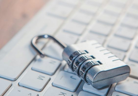A padlock on a computer keyboard