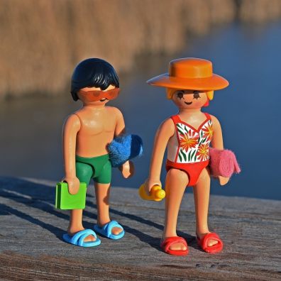 Toy models wearing beach clothes
