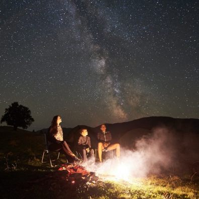 Camp fire with family