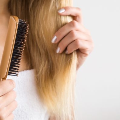 Lady brushing her hair