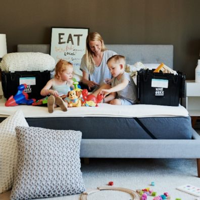 Moving home lady in bedroom