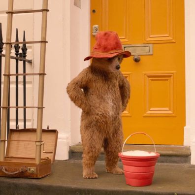 Paddington Bear with Window Cleaning Bucket. Family. Culture  (StudioCanal/Jay Maidment/PA)