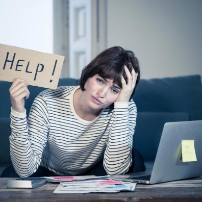  Portrait of worried young woman feeling stressed and desperate asking for help in paying debt