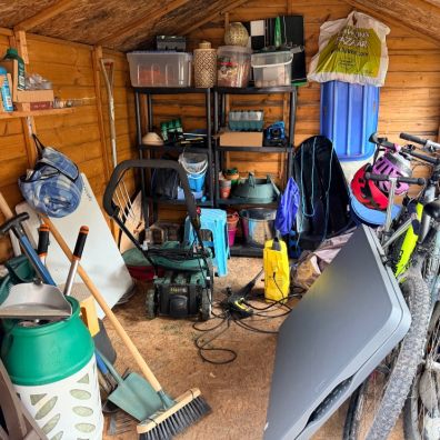 A cluttered garden shed