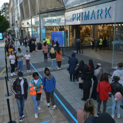 Shoppers queuing outside Primark