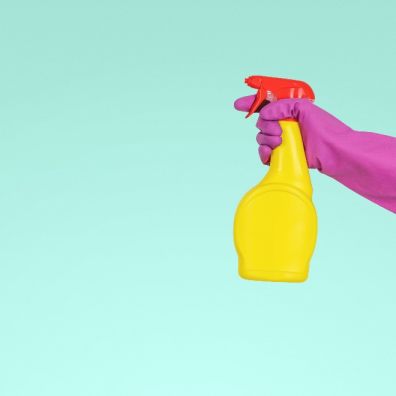 spraying cleaning product